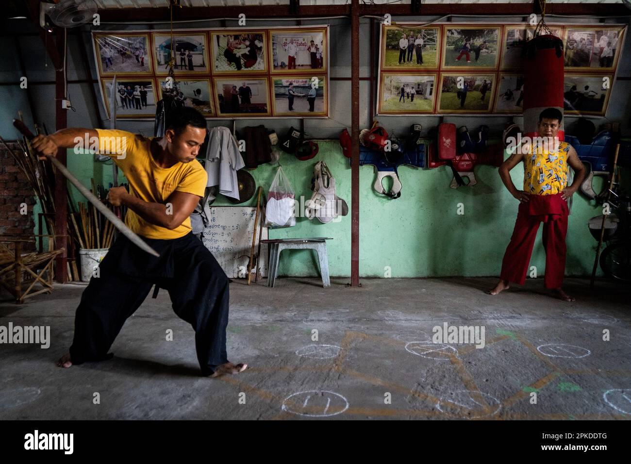 Martial artists practice Thaing Byaung Byan, a traditional form of Burmese Martial Arts, in a