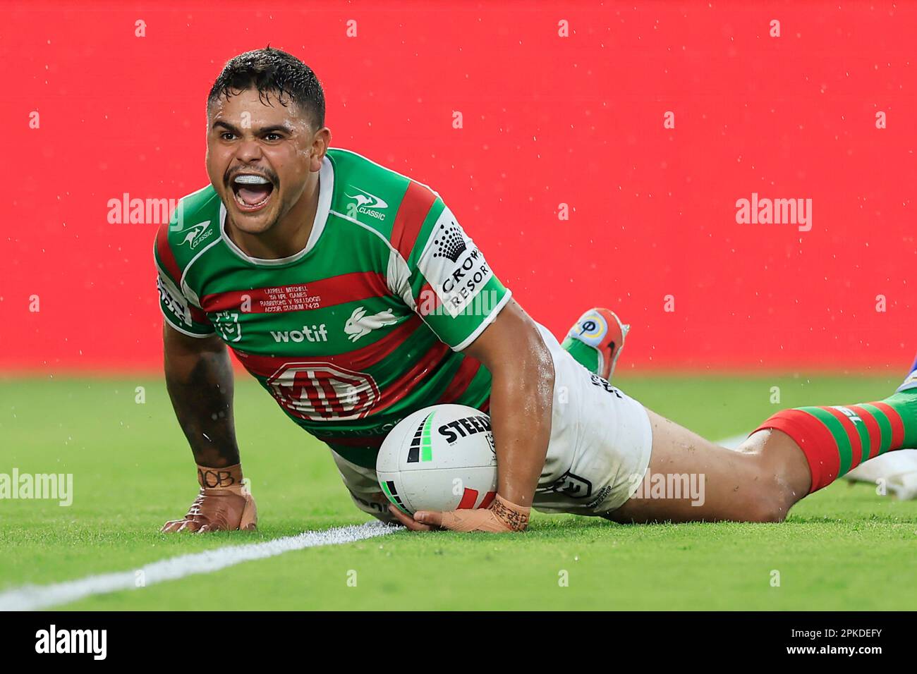 Latrell Mitchell of Souths scores his third try during the NRL Round 6 match between the