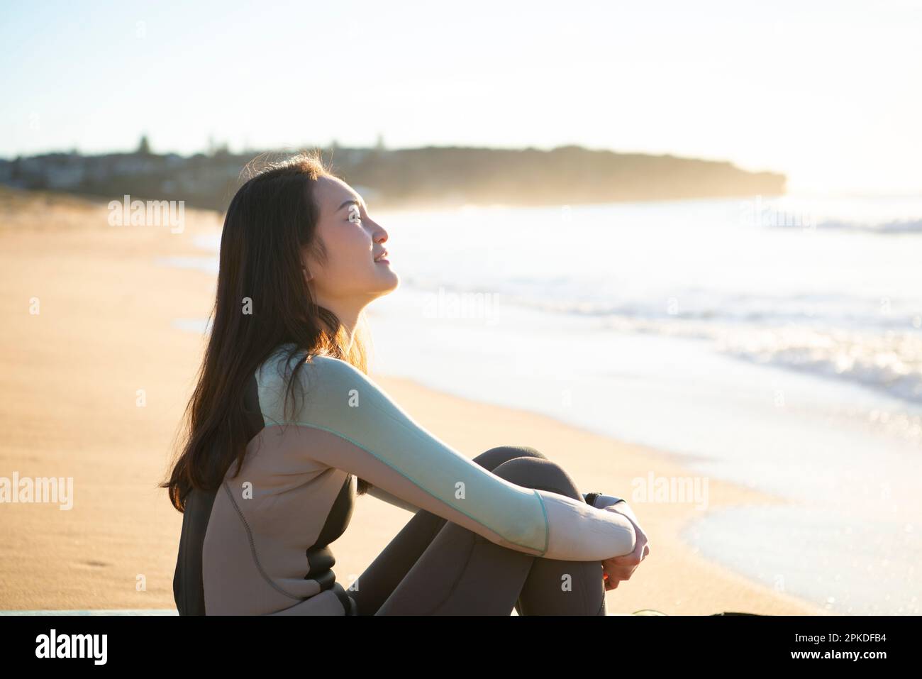 Asian woman surfer wetsuit hi-res stock photography and images - Alamy