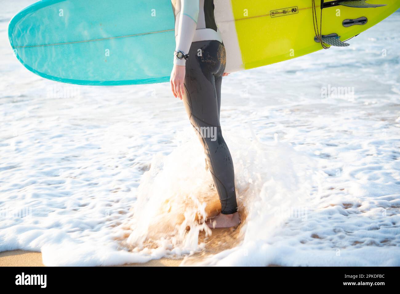 Asian woman surfer wetsuit hi-res stock photography and images - Alamy