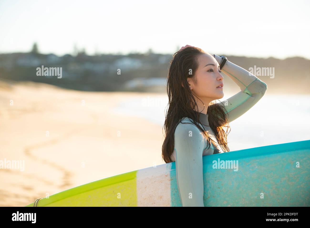 Woman surfboard in sea hi-res stock photography and images - Alamy
