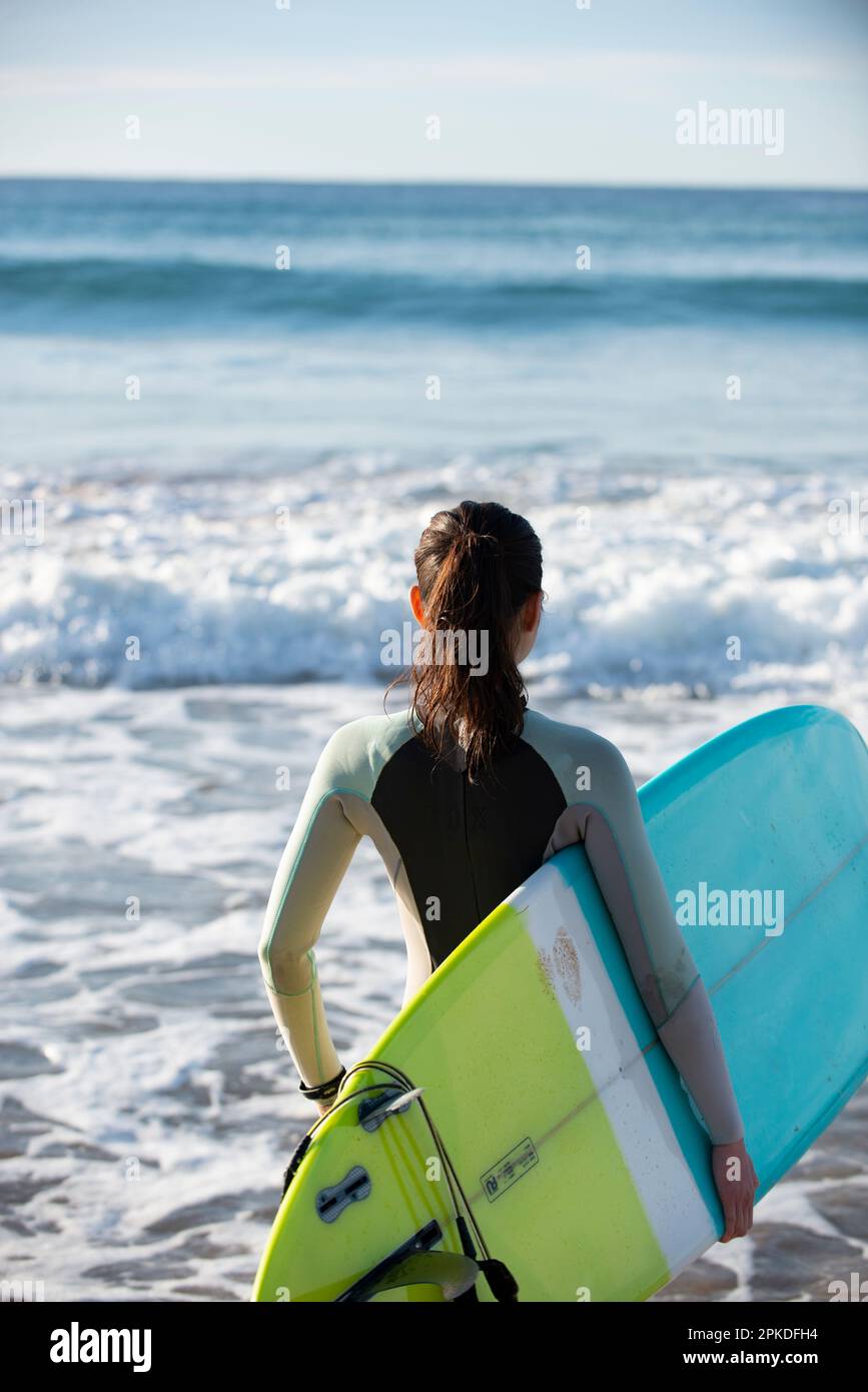 Asian woman surfer wetsuit hi-res stock photography and images - Alamy