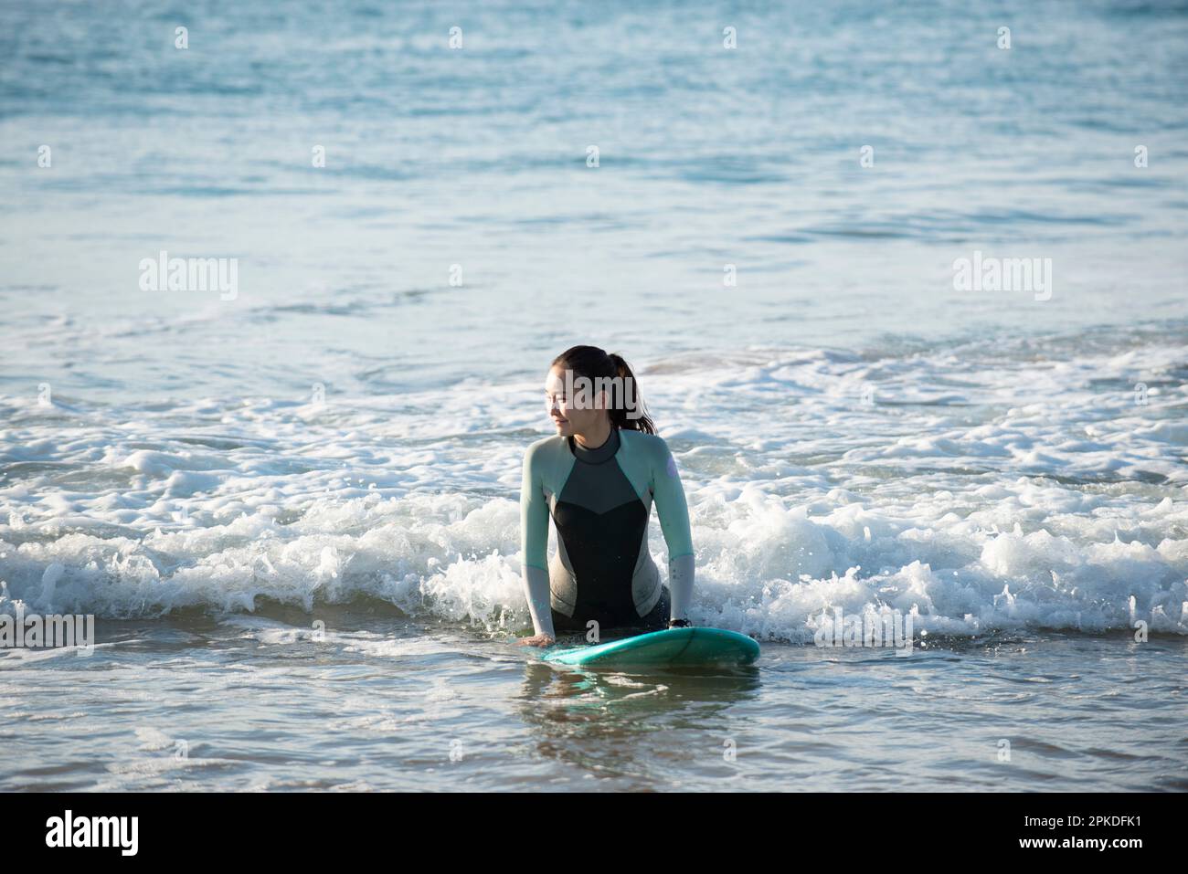 Surfer in wetsuit riding on hi-res stock photography and images - Alamy