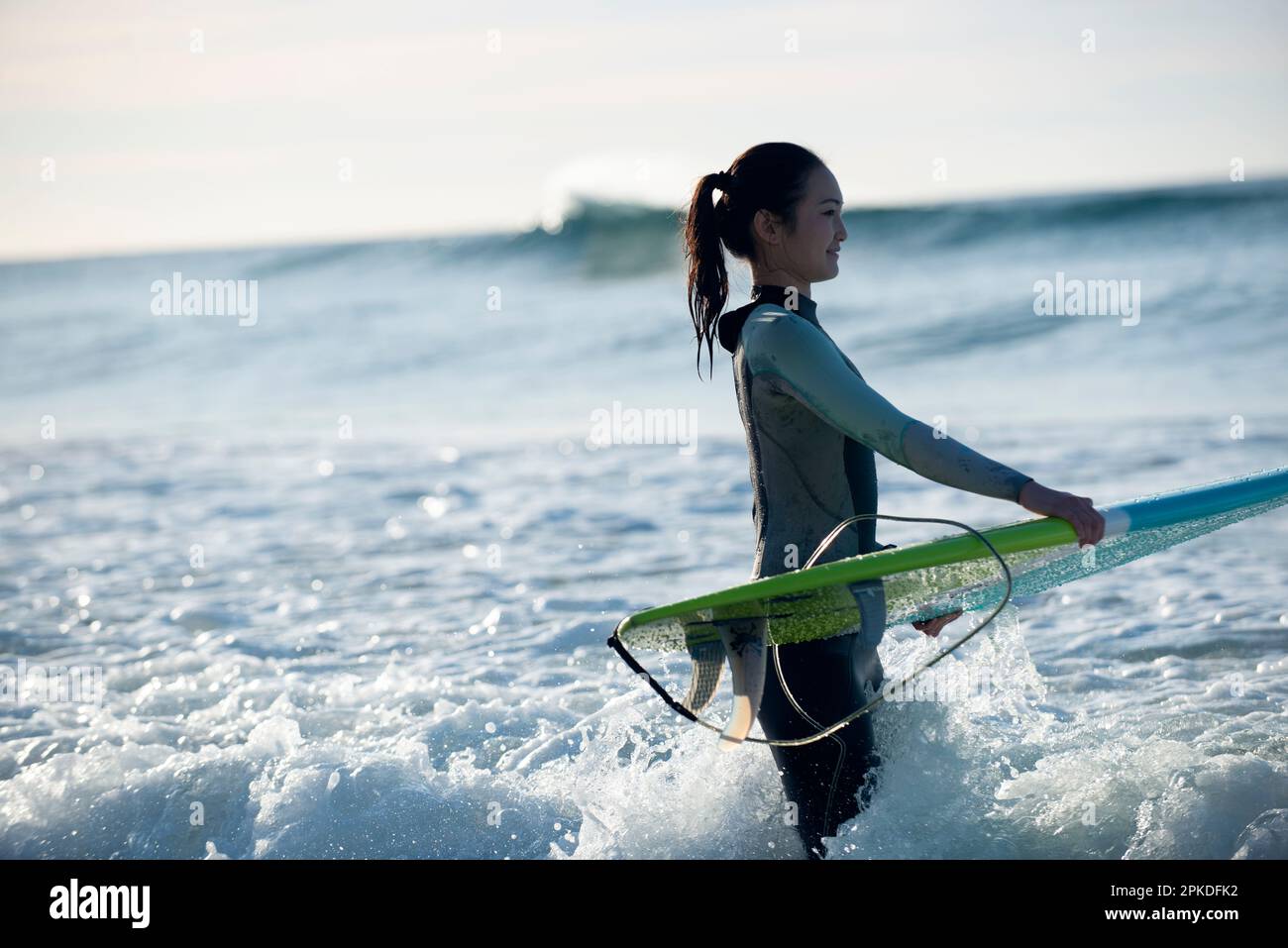 Asian woman surfer wetsuit hi-res stock photography and images - Alamy