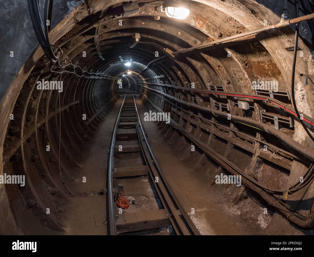 General view inside a tunnel of Mail Rail, the former  Post Office Railway system under the streets of central London, England. Stock Photo