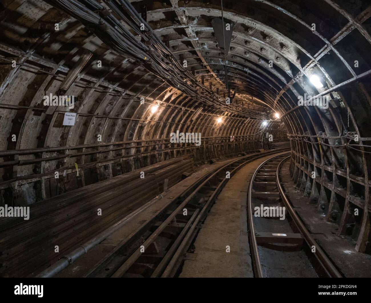 General view inside a tunnel of Mail Rail, the former  Post Office Railway system under the streets of central London, England. Stock Photo
