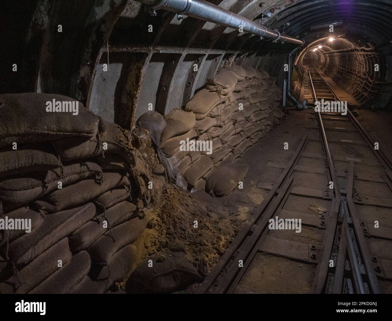 Safety run off area with sand bags inside a tunnel of Mail Rail, the