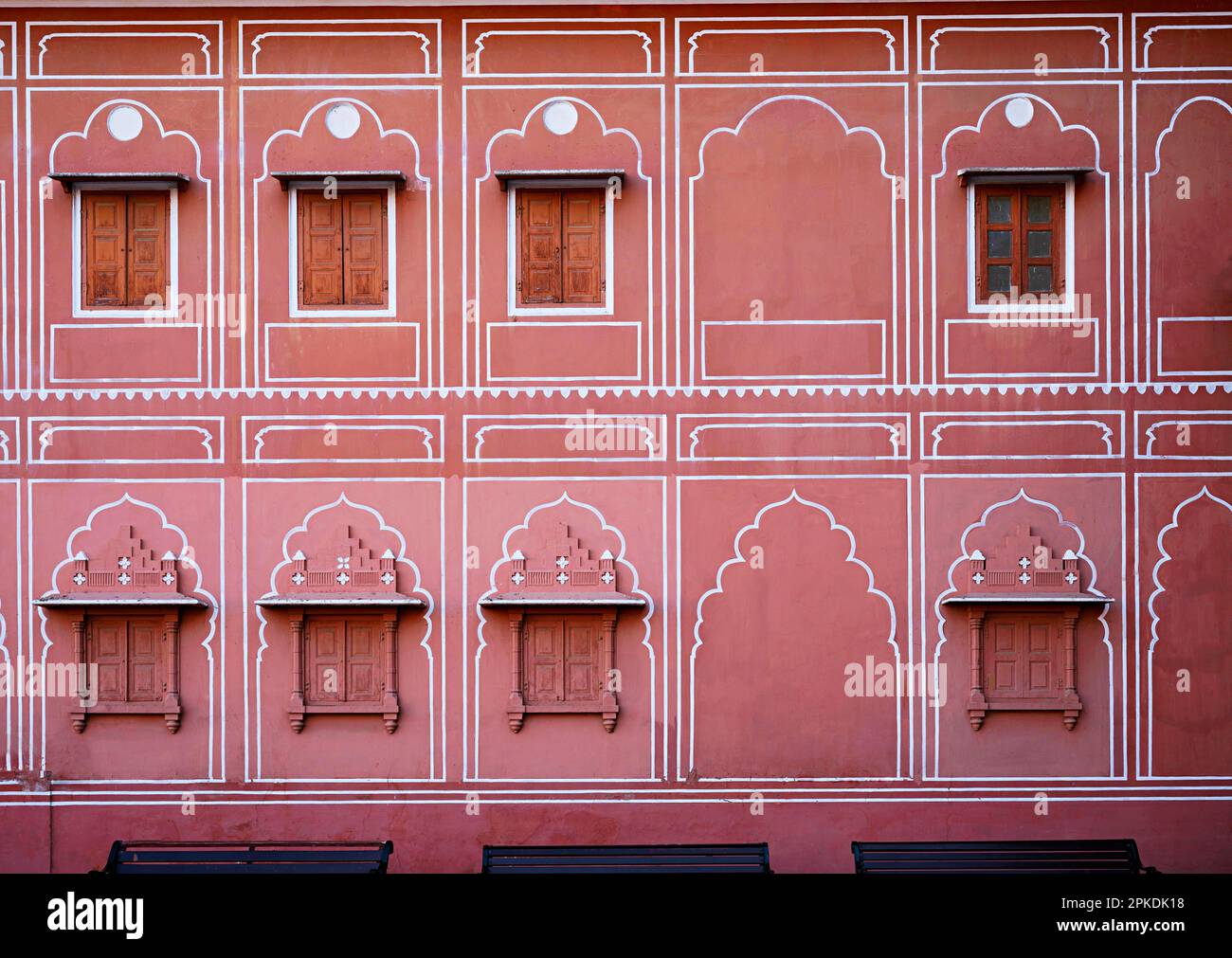 Carved windows on the wall of Sarvato Bhadra Chowk, a single-storeyed, square, open hall with enclosed rooms at the four corners. City Palace, Jaipur, Stock Photo
