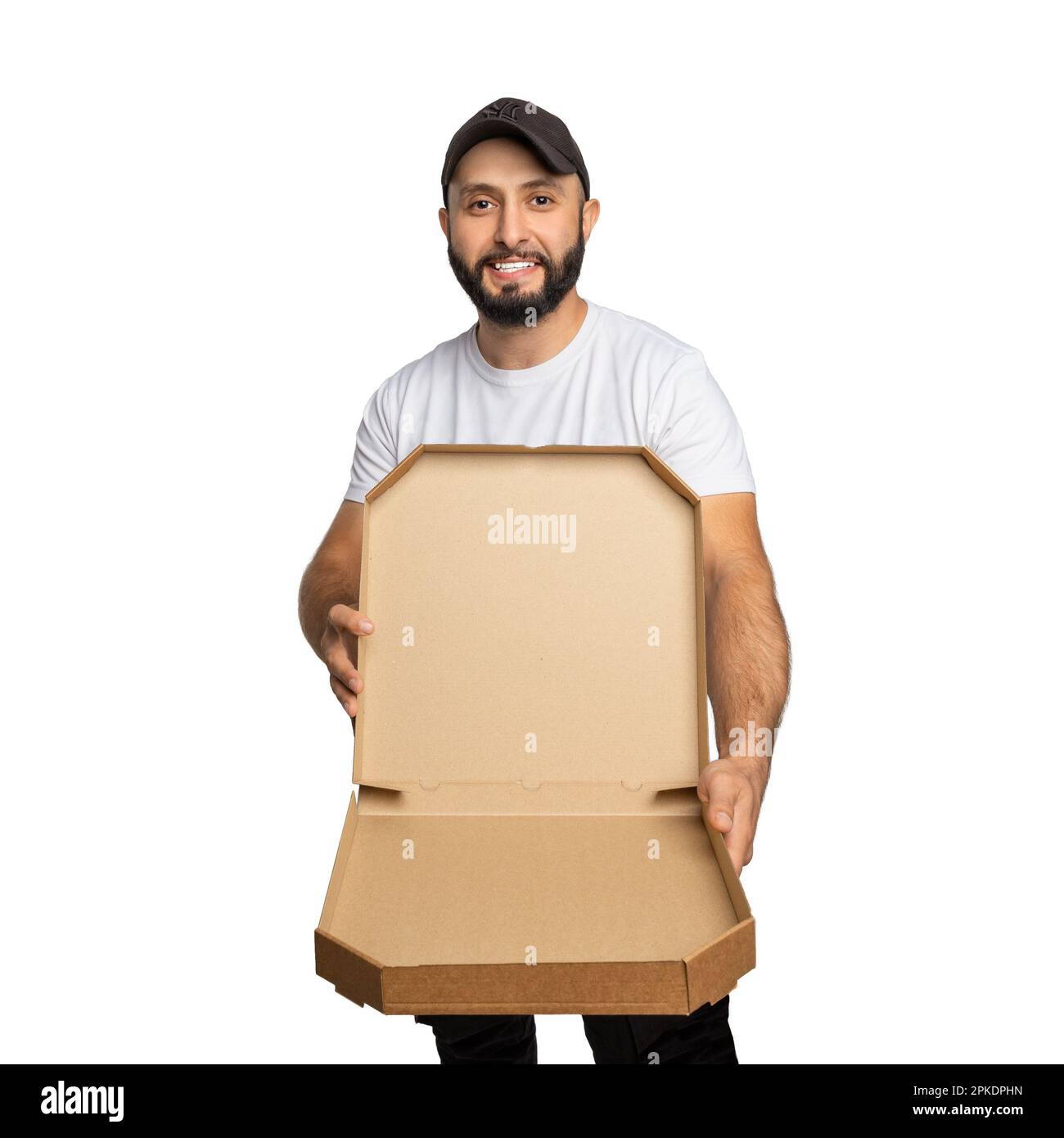 Young bearded man smiling while posing with open pizza box isolated over white background. Can be used to represent your product. Stock Photo