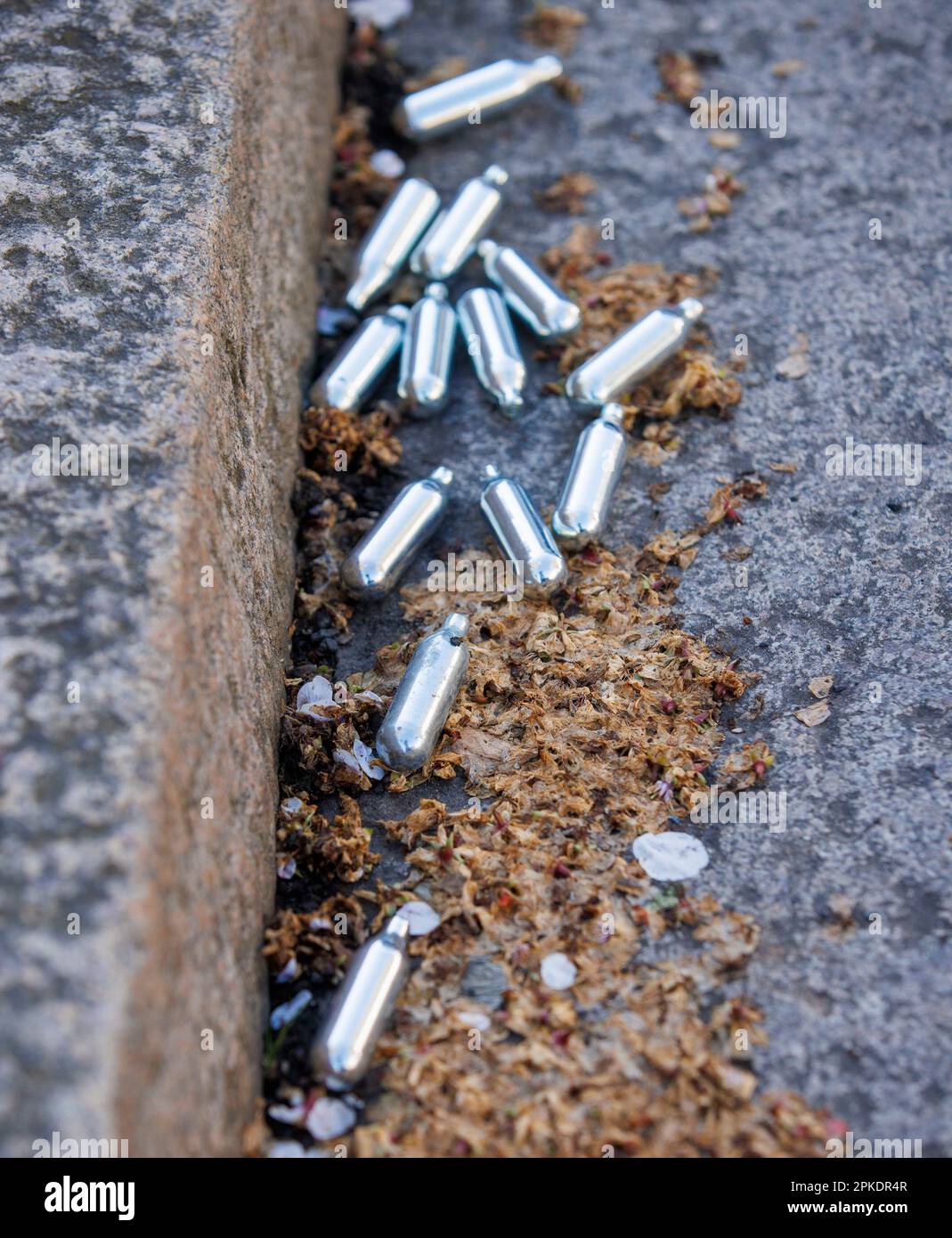 London, UK. 7th Apr, 2023. Canisters of Nitrous Oxide in a street in