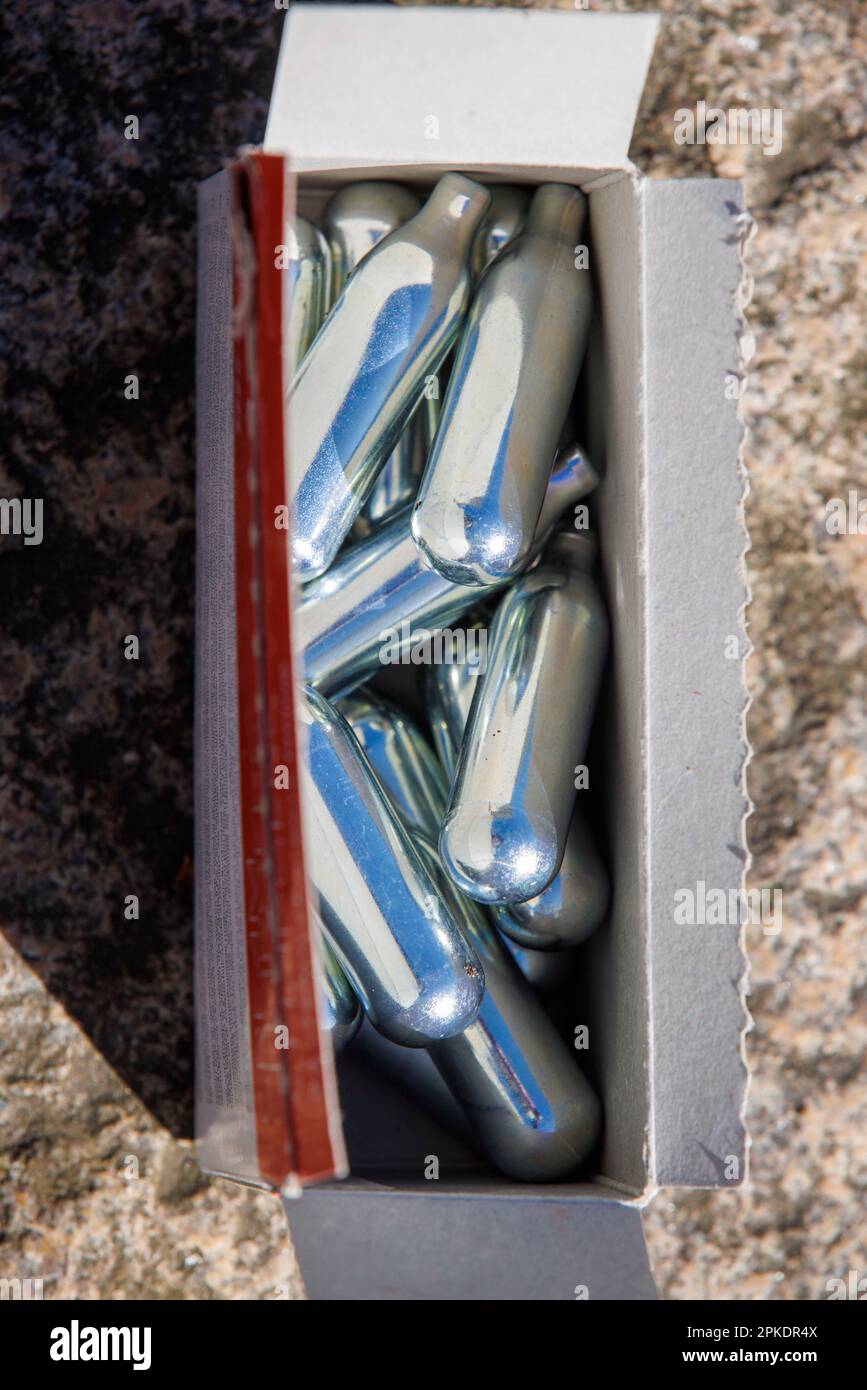 London, UK. 7th Apr, 2023. Canisters of Nitrous Oxide in a street in