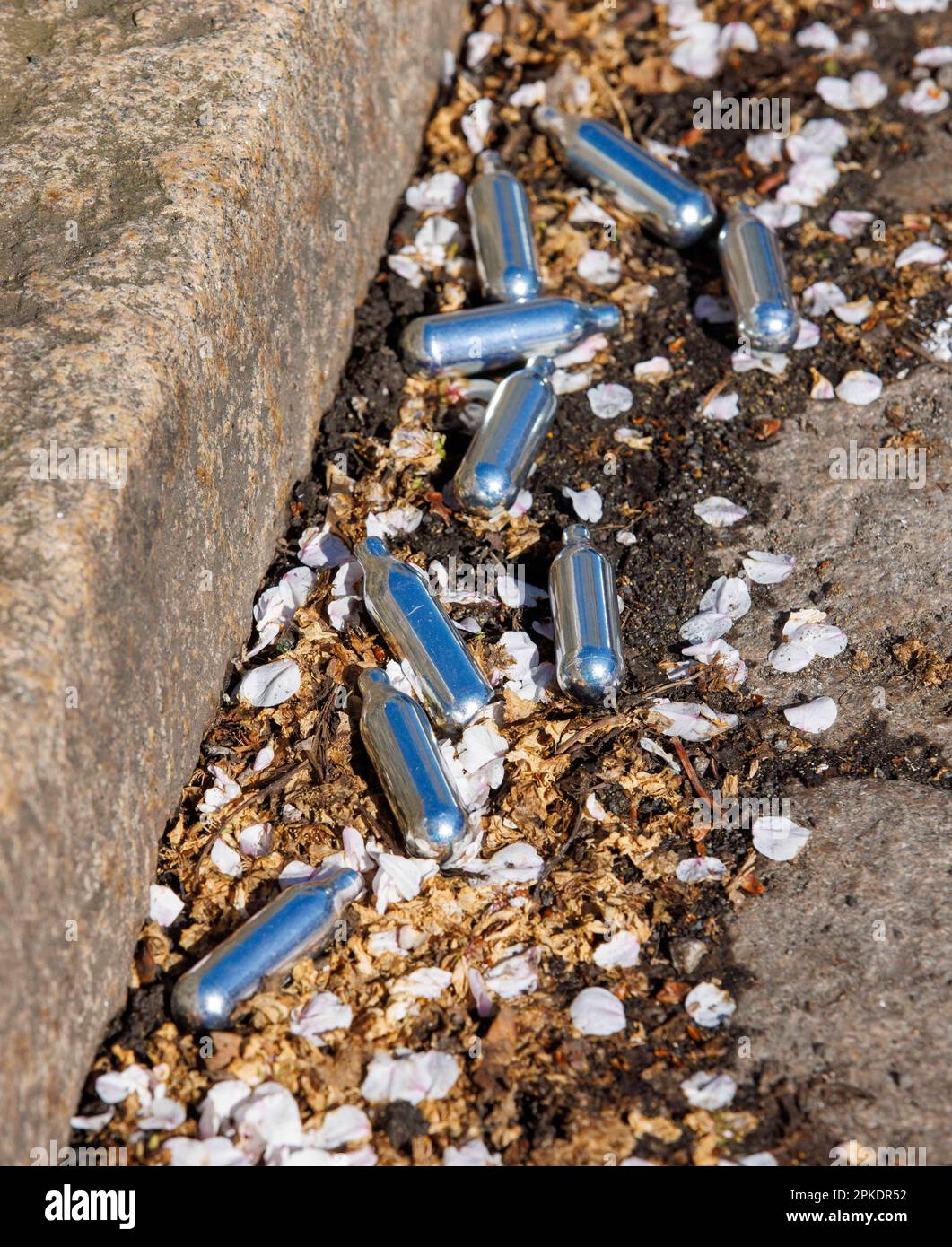 London, UK. 7th Apr, 2023. Canisters of Nitrous Oxide in a street in