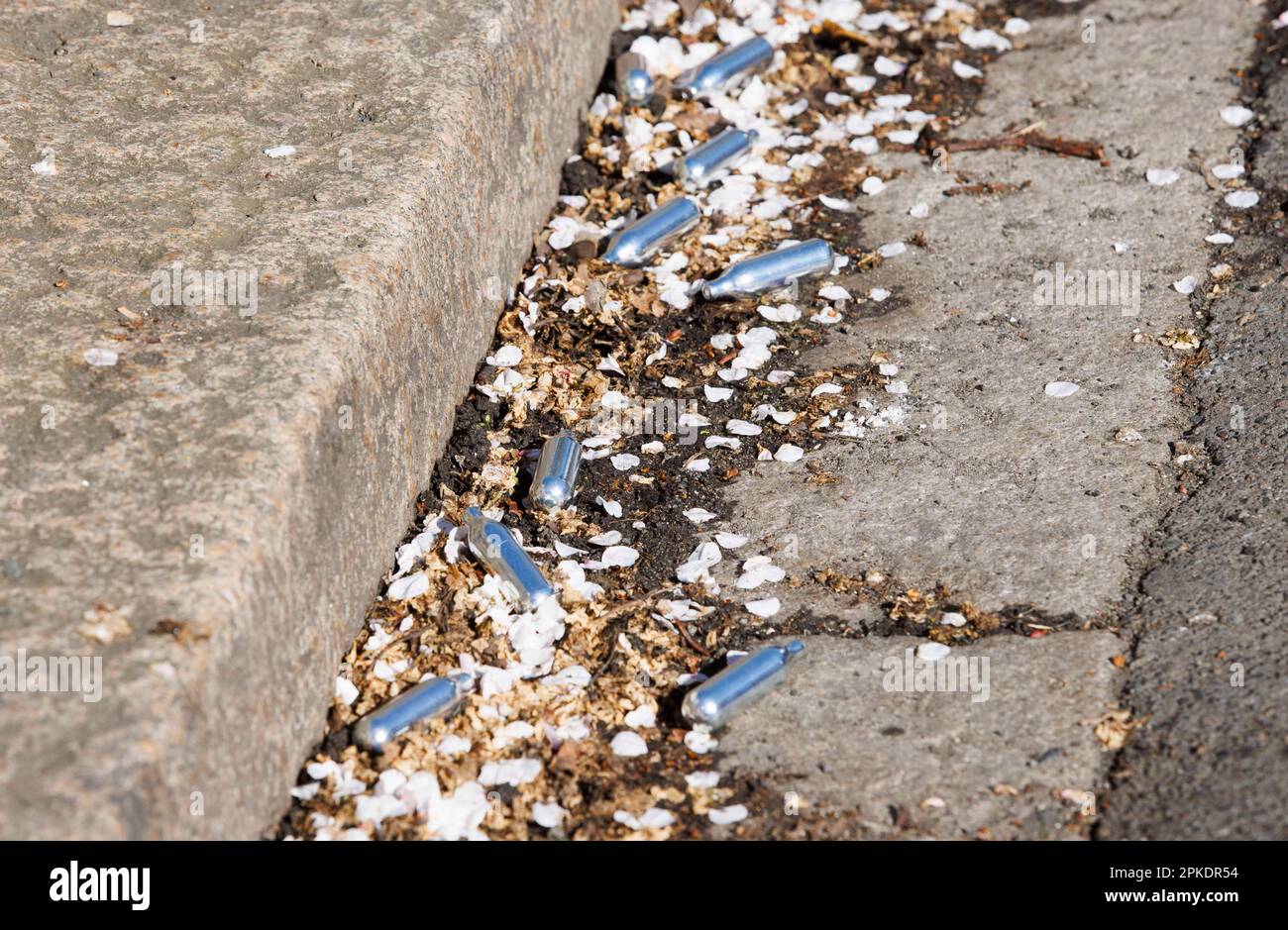 London, UK. 7th Apr, 2023. Canisters of Nitrous Oxide in a street in