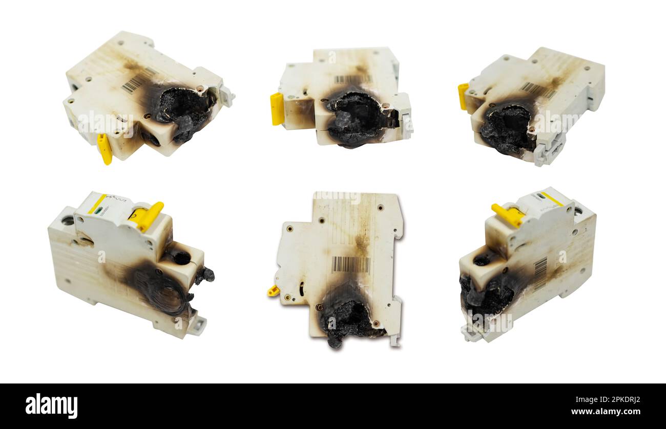 Several burned fuse boxes on a white background. Stock Photo