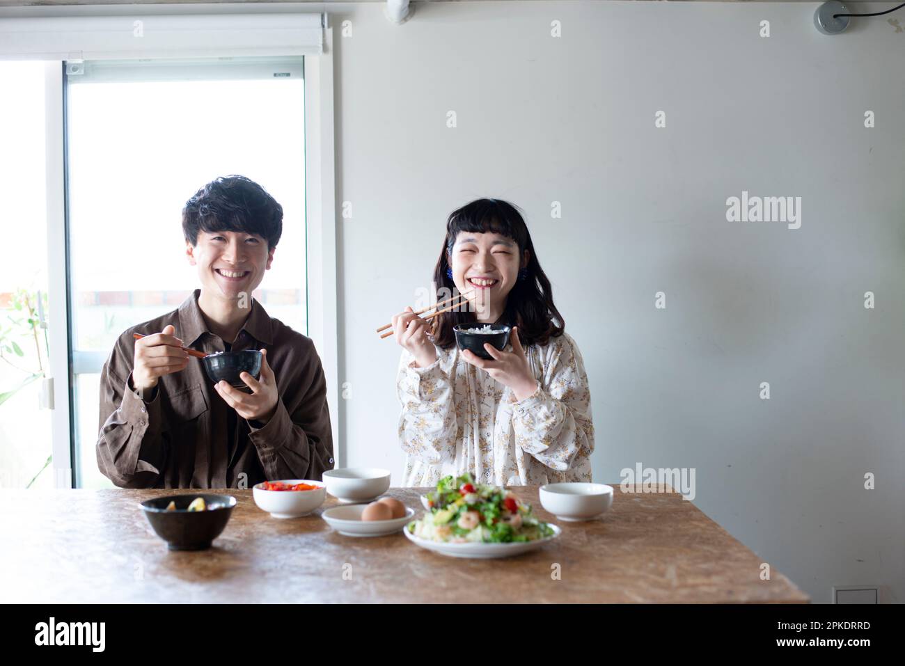 Couple having dinner at home Stock Photo