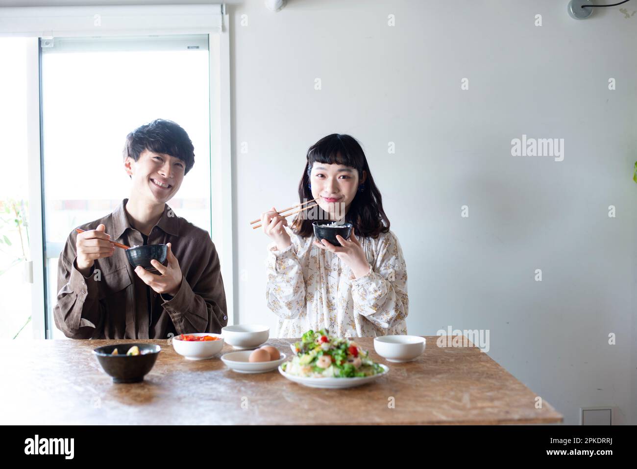 Couple eating dinner at home Stock Photo