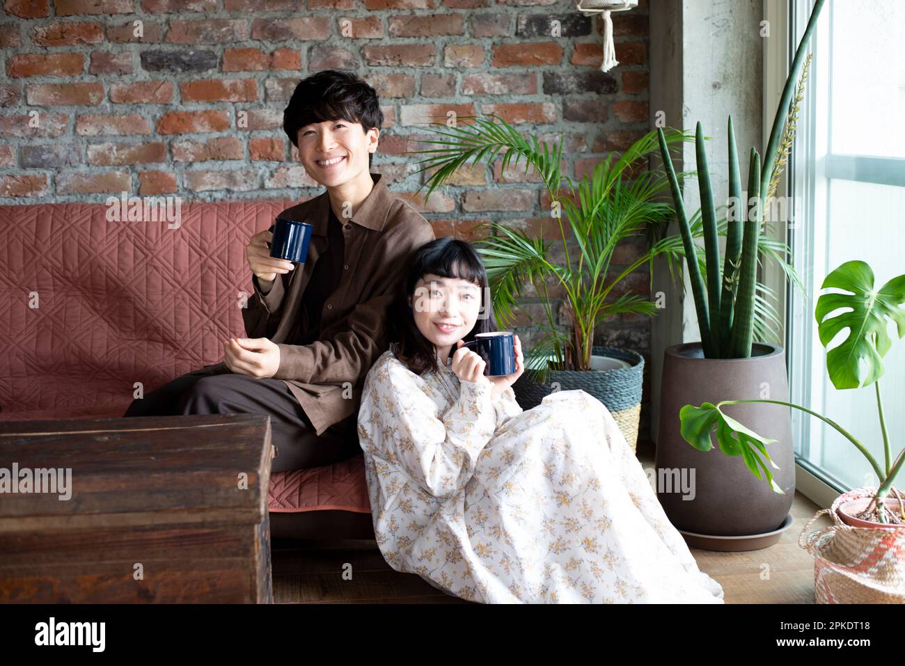 Asian couple home hi-res stock photography and images - Alamy