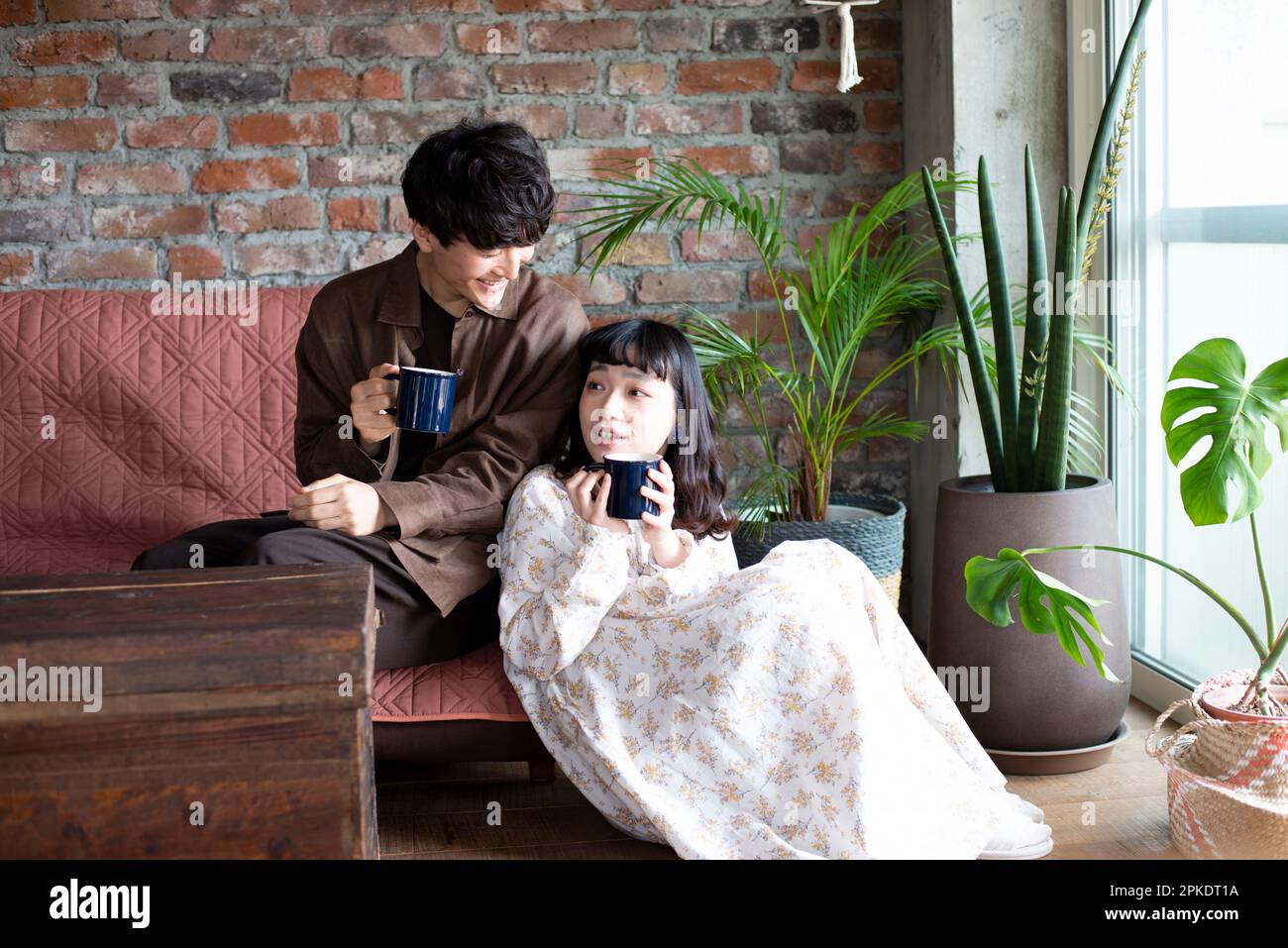 Asian couple home hi-res stock photography and images - Alamy