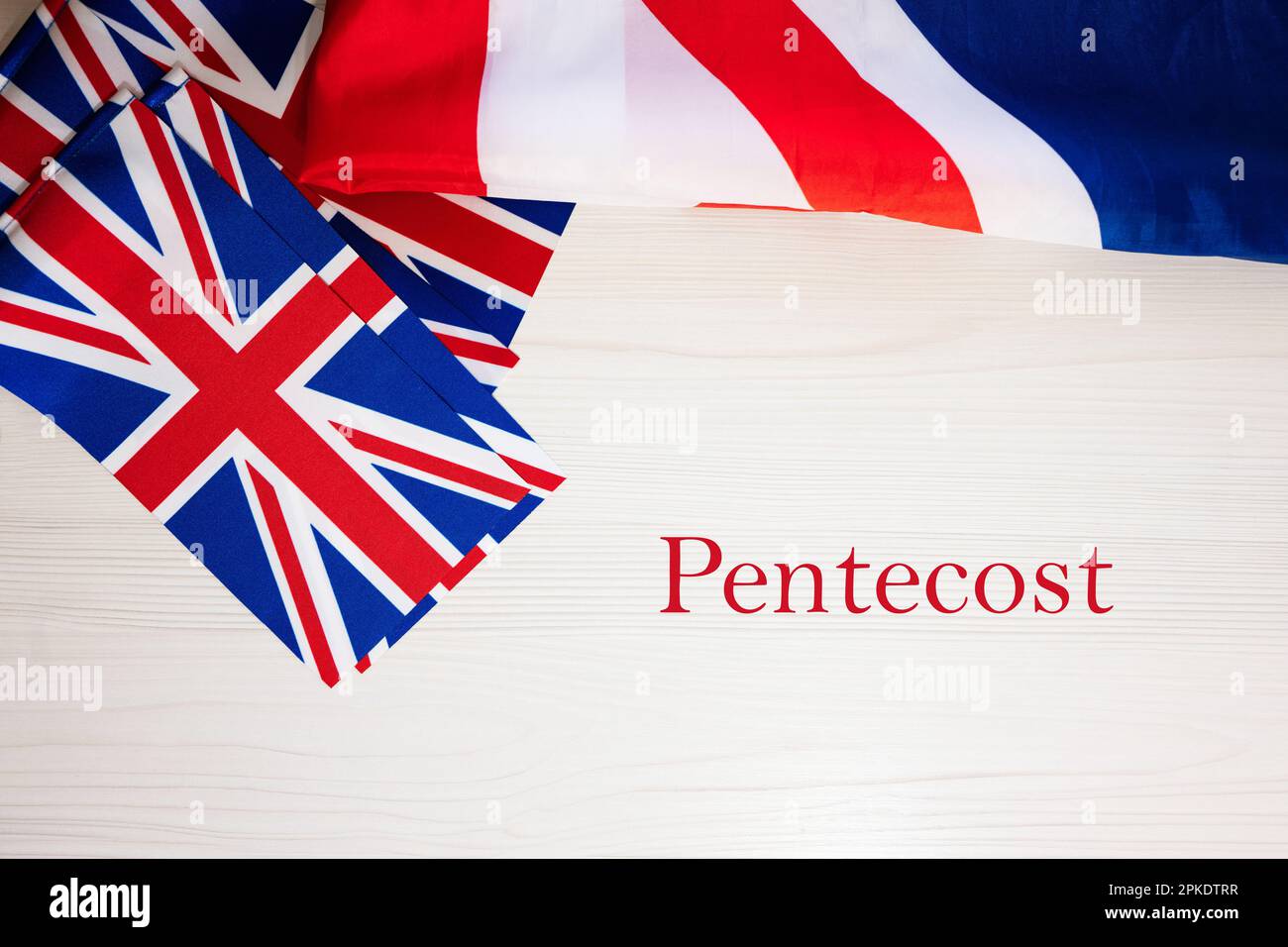 Pentecost. British holidays concept. Holiday in United Kingdom. Great Britain flag background. Stock Photo