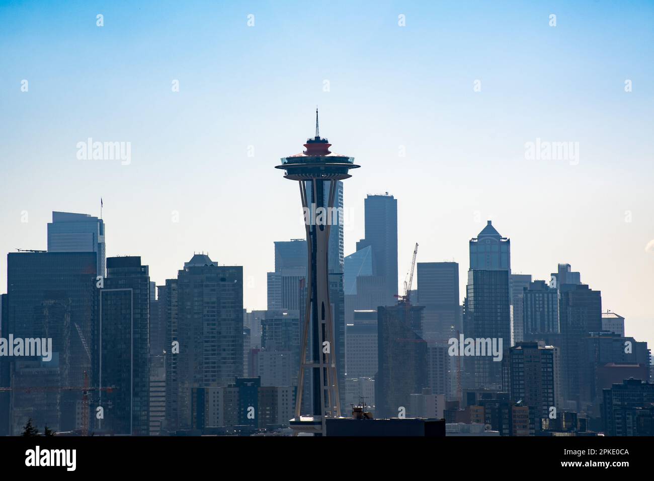 The Seattle skyline on a clear sunny day with the Space Needle in the foreground and Downtown behind it. Stock Photo