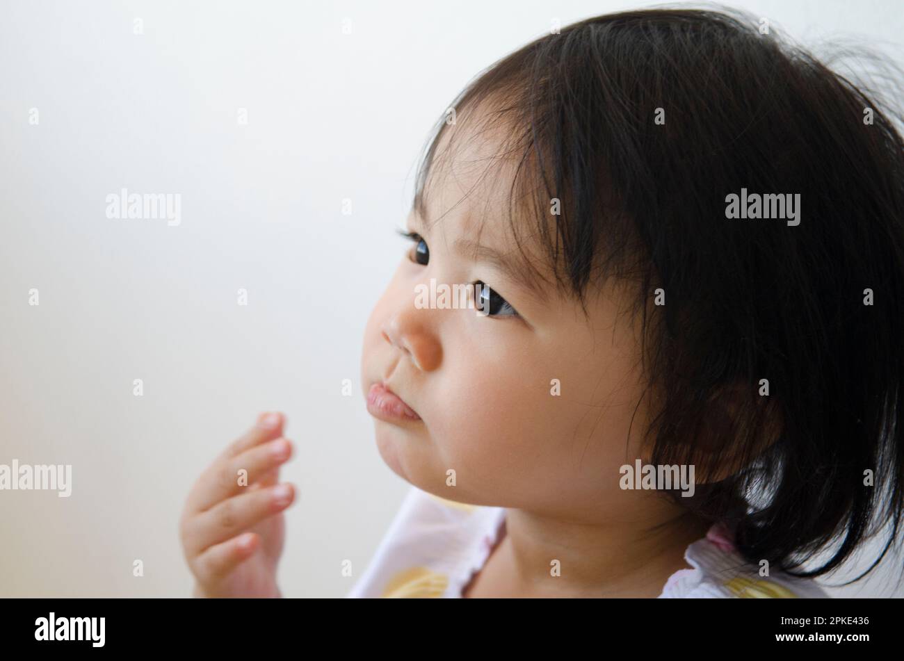 Girl looking at something Stock Photo