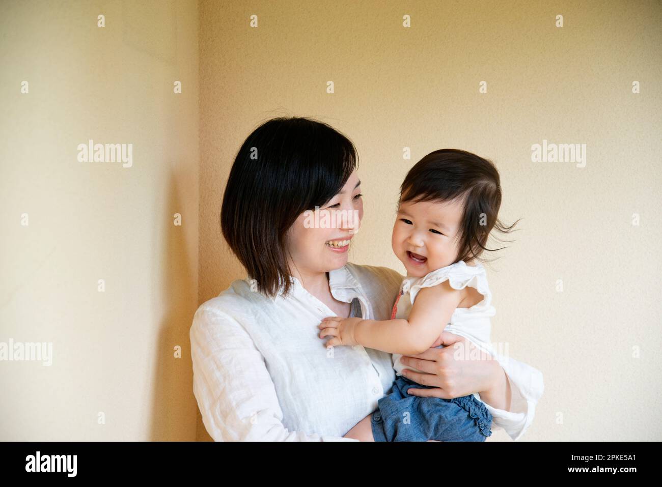 Laughing parent and child Stock Photo