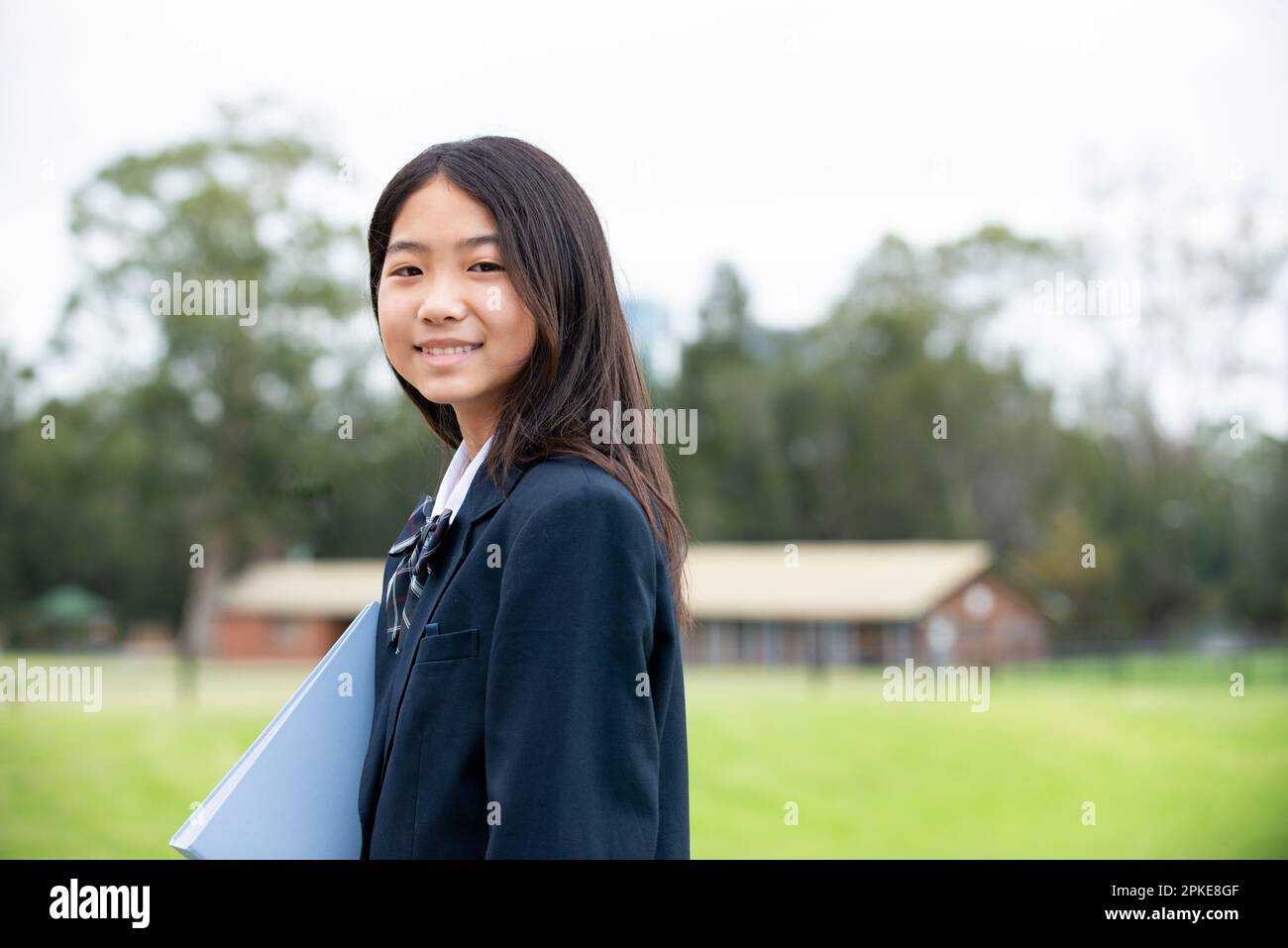 female-student-in-school-uniform-smiling-stock-photo-alamy