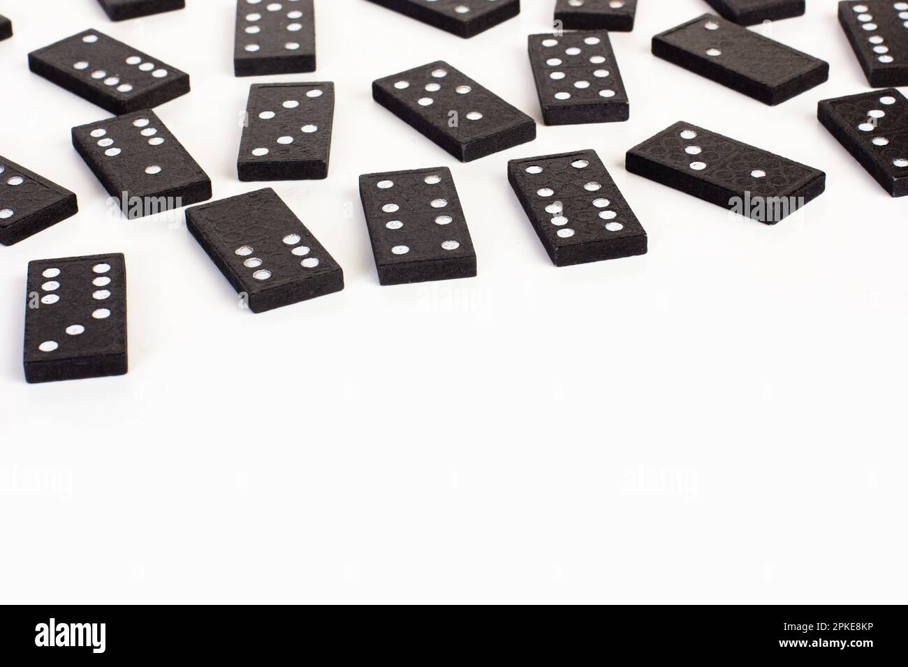 Black Dominoes game block on a colored background Stock Photo - Alamy