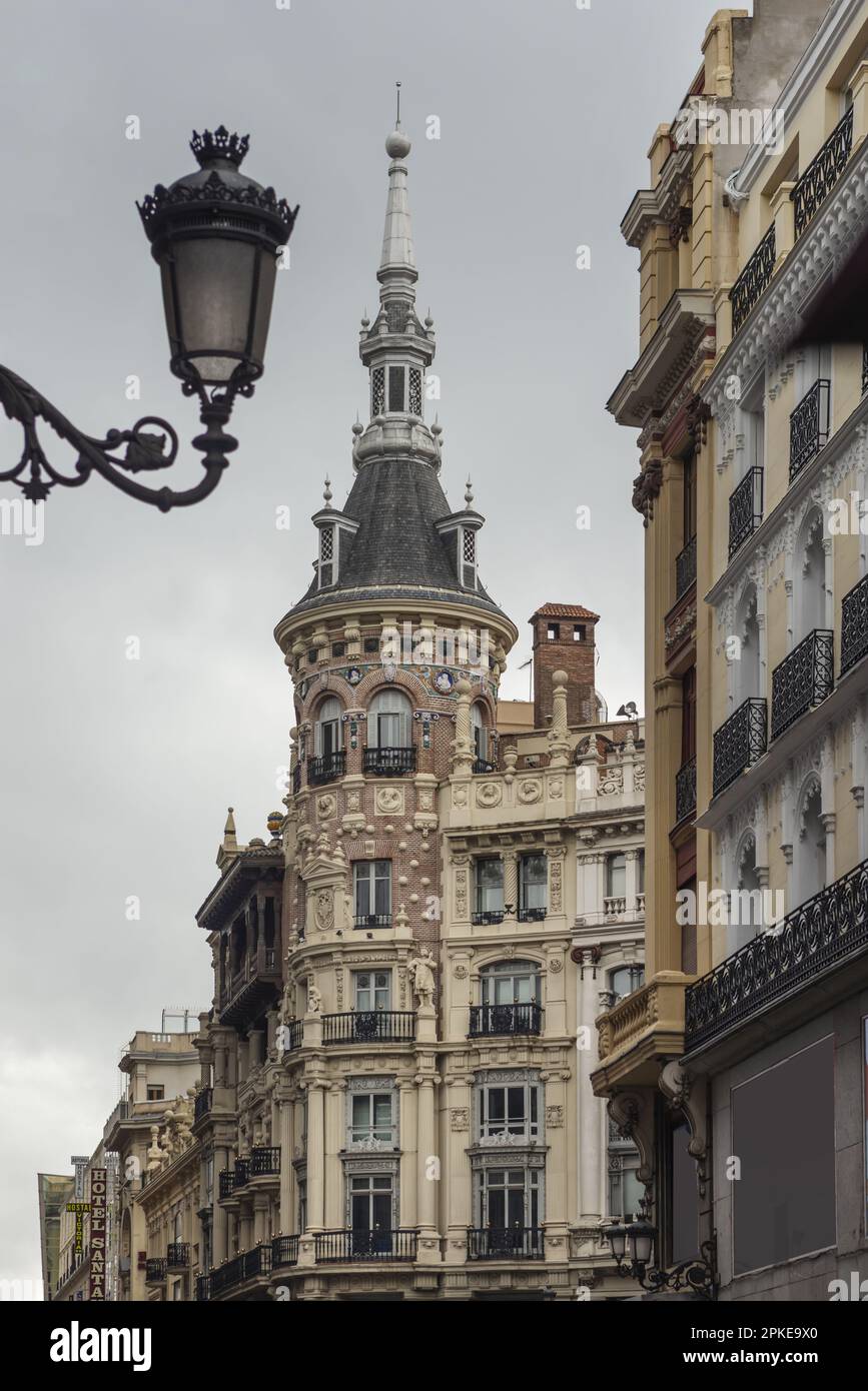 Old building in the center of the city of Madrid with a beautiful and curious circular tower Stock Photo