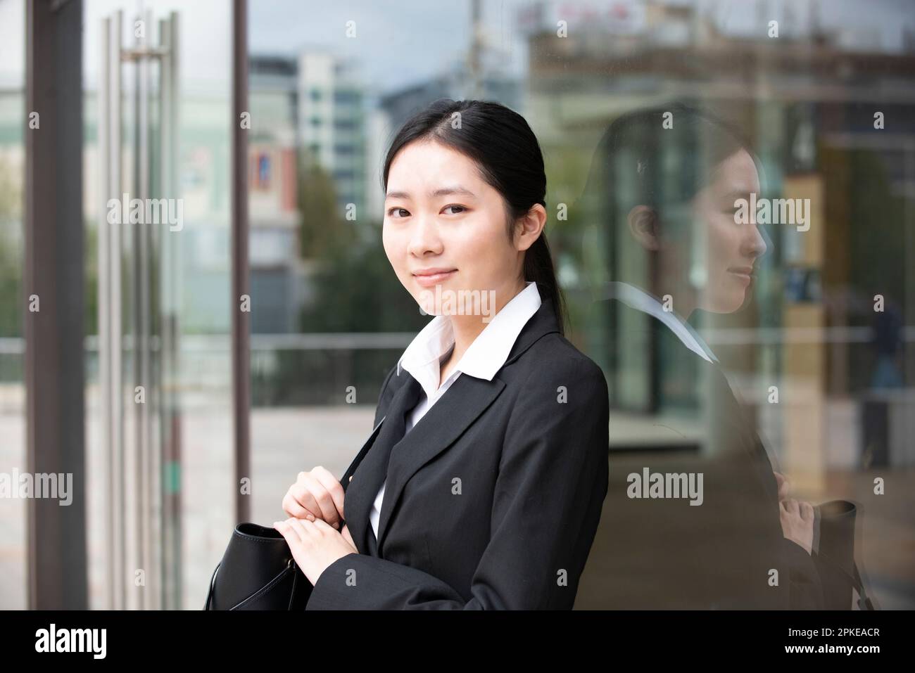 Looking black suit hi-res stock photography and images - Alamy
