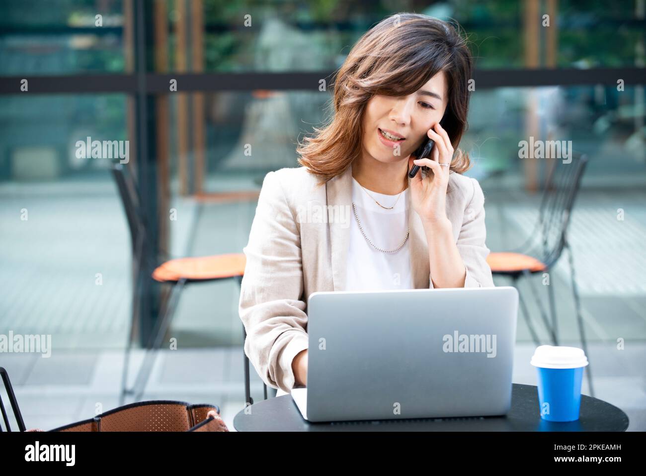 Phone call open laptop work hi-res stock photography and images - Alamy