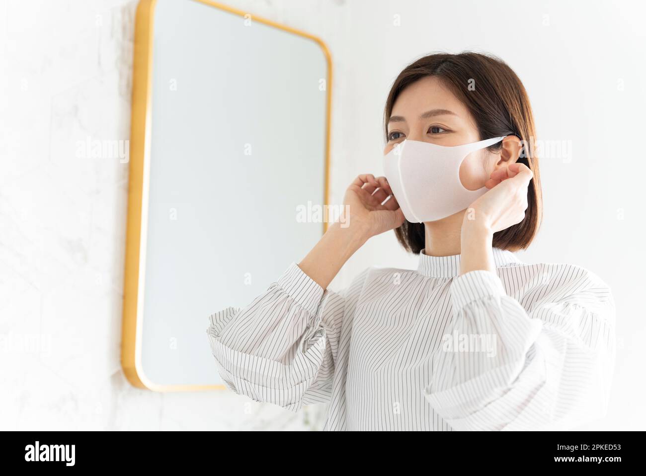 Beautiful asian woman wearing mask hi-res stock photography and images ...