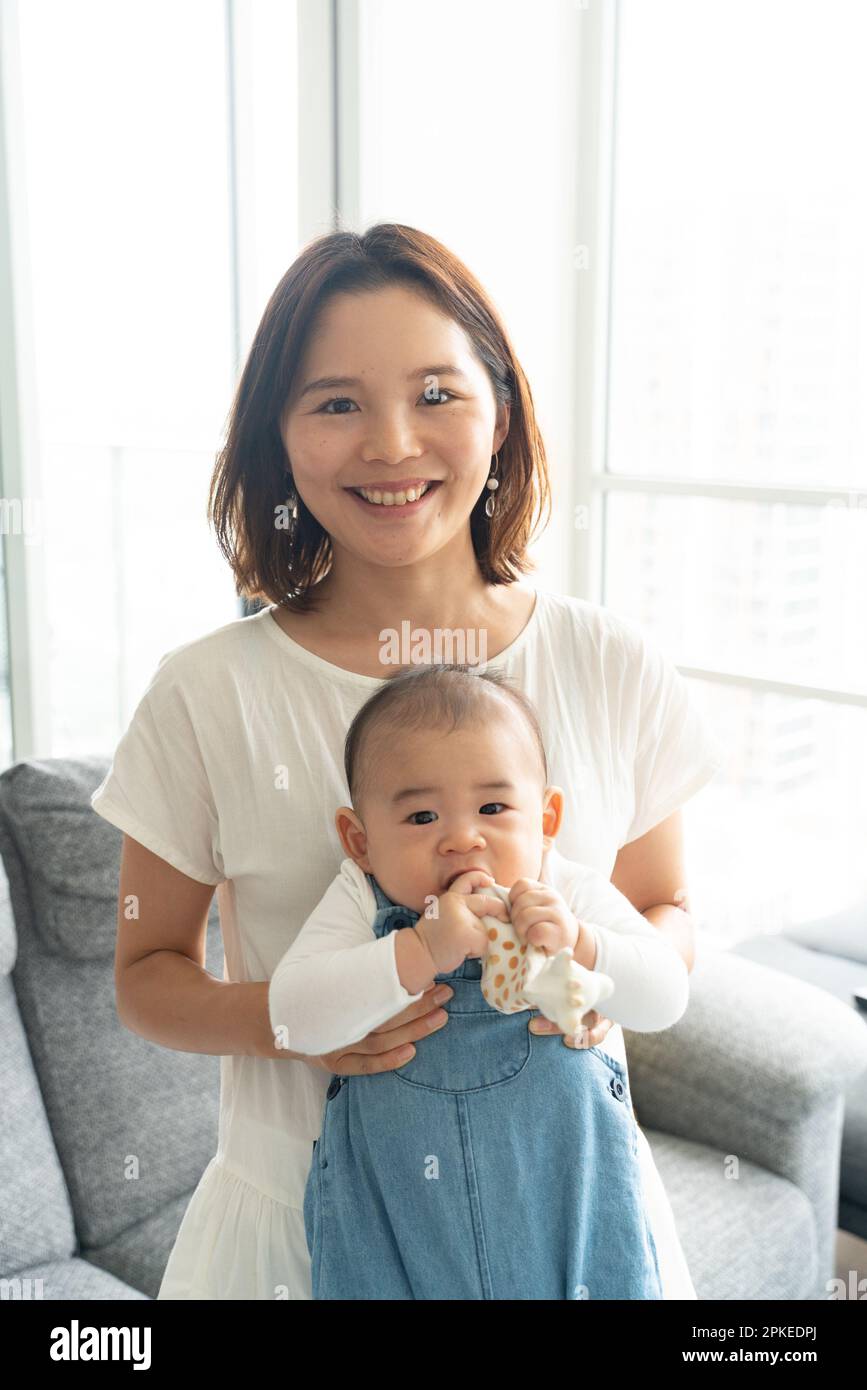 Portrait happy mother baby home hi-res stock photography and images - Alamy
