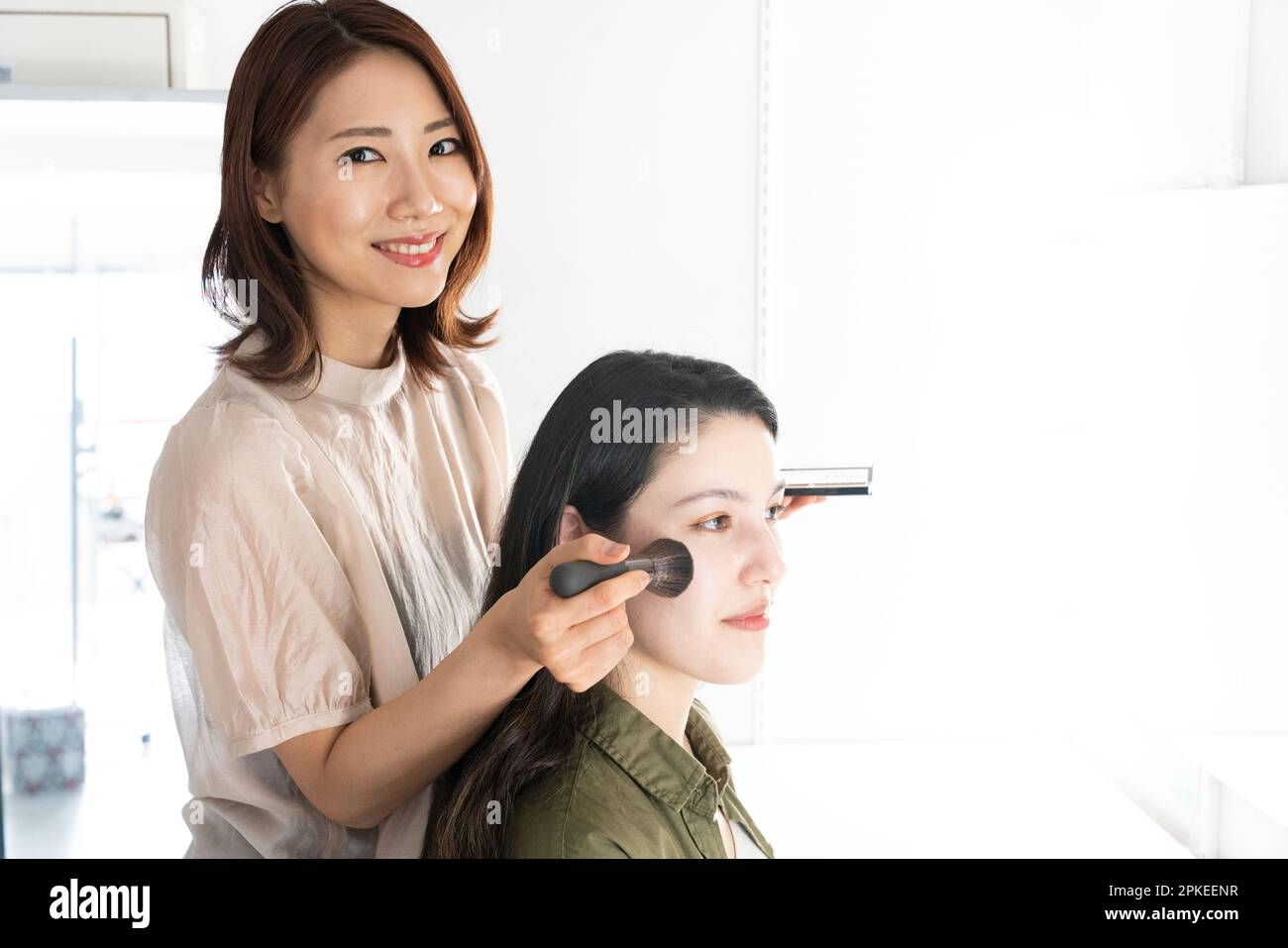 Two women in a make-up room Stock Photo