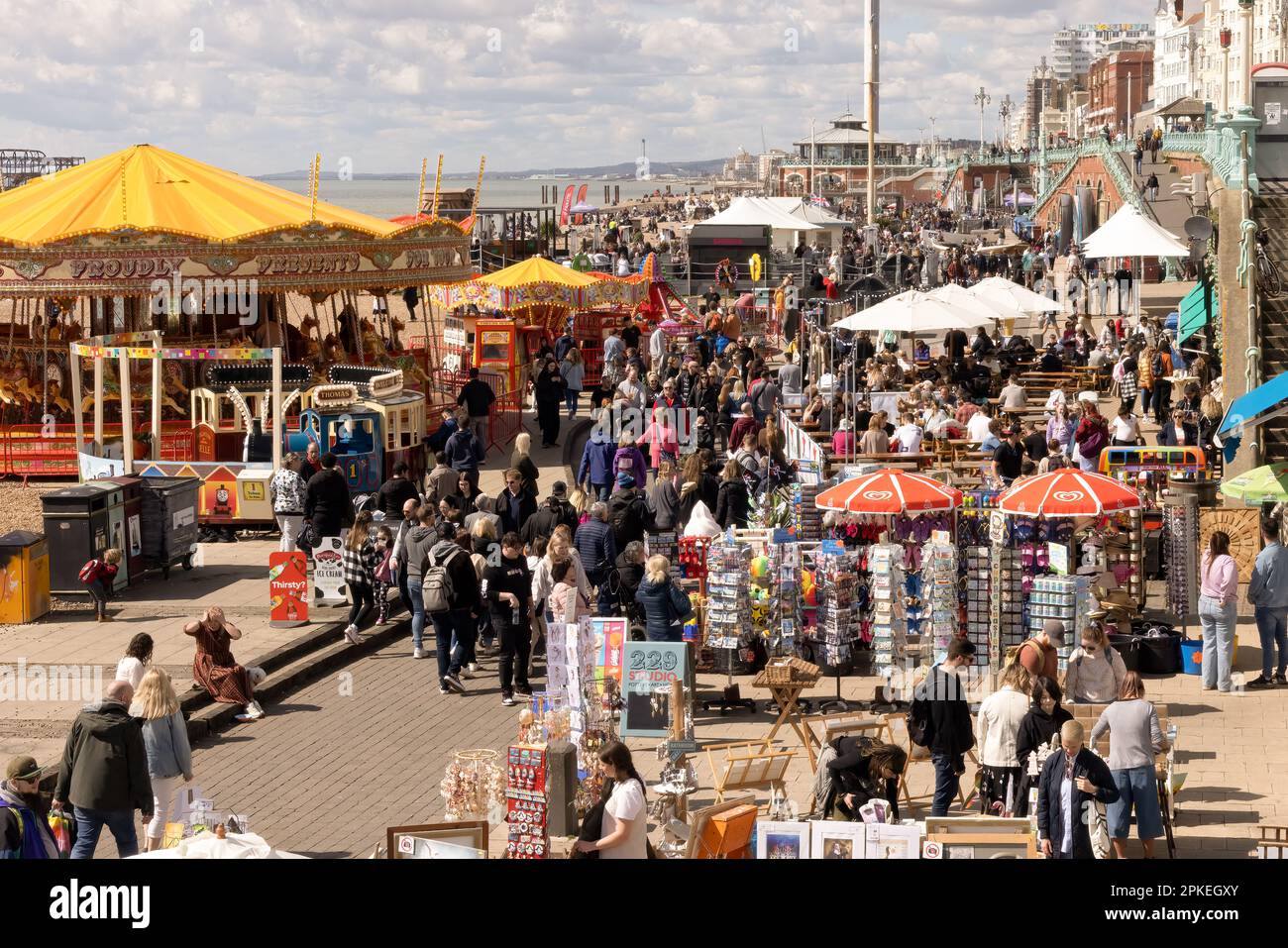 Brighton Beach, City of Brighton & Hove, East Sussex,UK. Visitors and locals staycation at 