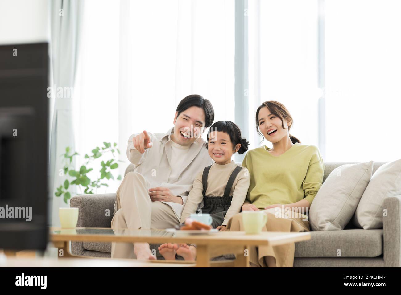 Family watching TV Stock Photo