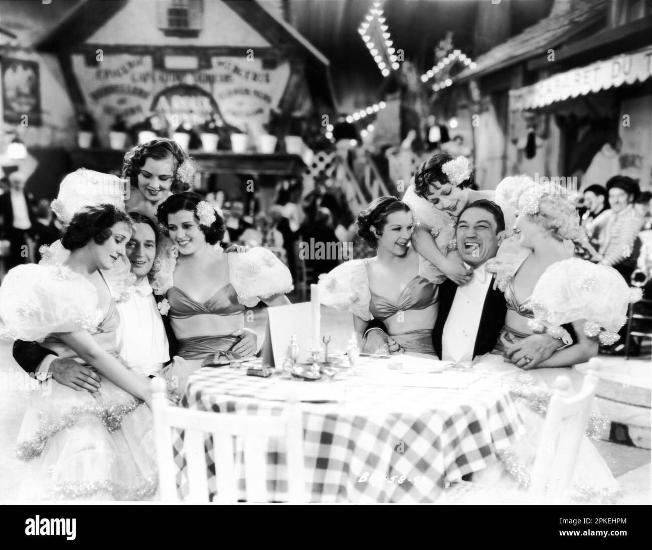 EDMUND LOWE and VICTOR McLAGLEN with Nightclub Hostesses in HOT PEPPER 1933 director JOHN G. BLYSTONE story Dudley Nichols Fox Film Corporation Stock Photo