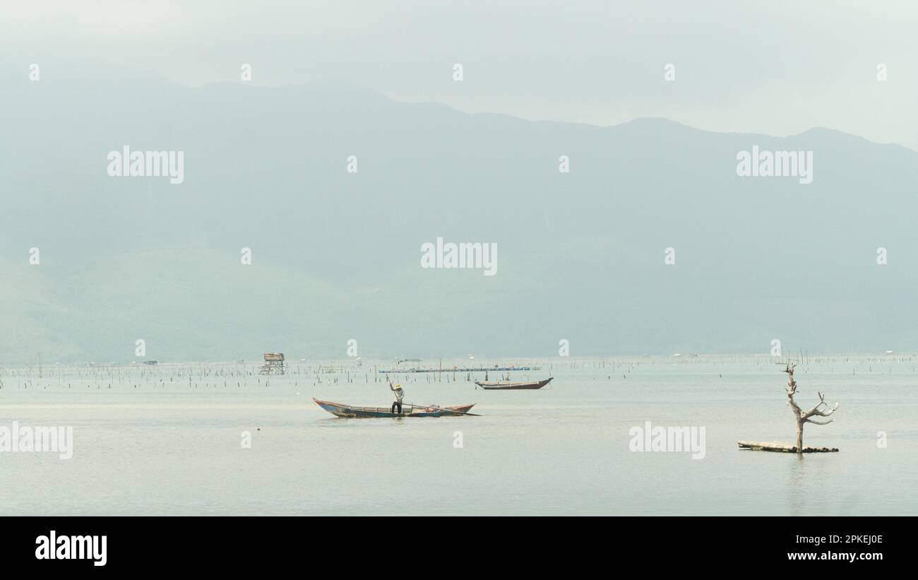 Fishing boat, snag, river and sky one background Stock Photo Alamy