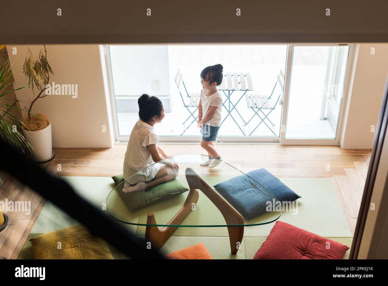 Sisters playing in a Japanese-style room Stock Photo