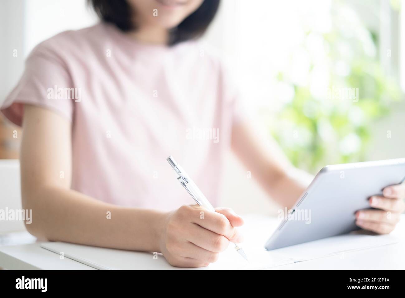 High school student studying at home Stock Photo
