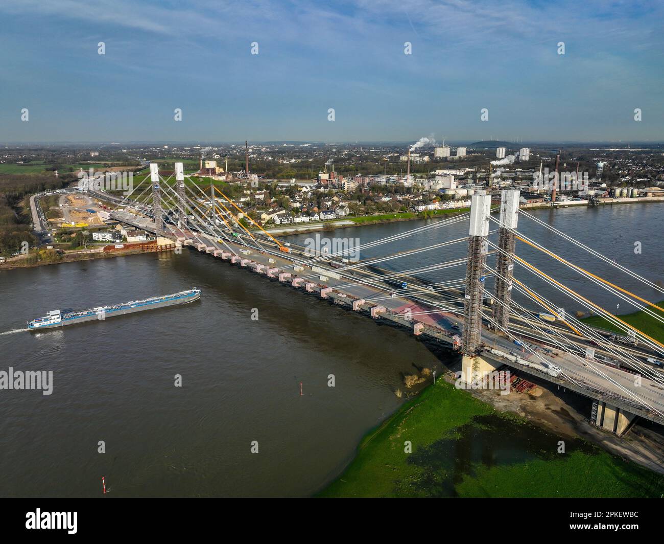 Duisburg, North Rhine-Westphalia, Germany - Neuenkamp Rhine Bridge construction site, A40 motorway new bridge construction, the new bridge in front an Stock Photo