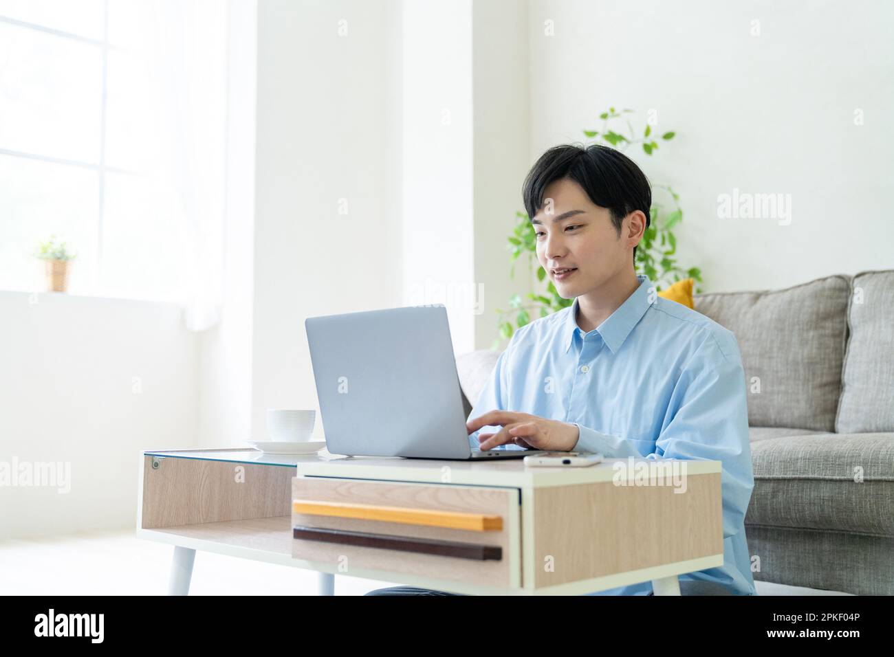 Man working remotely Stock Photo