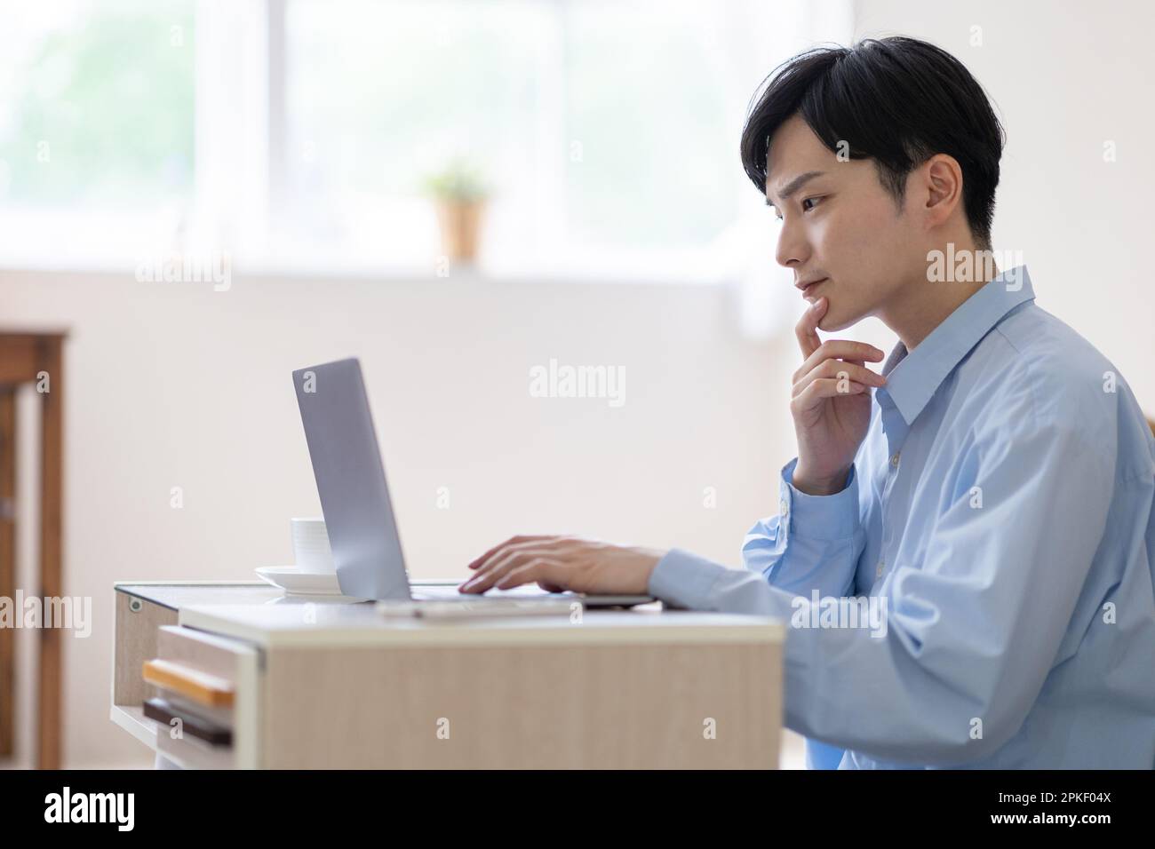 Man working remotely Stock Photo