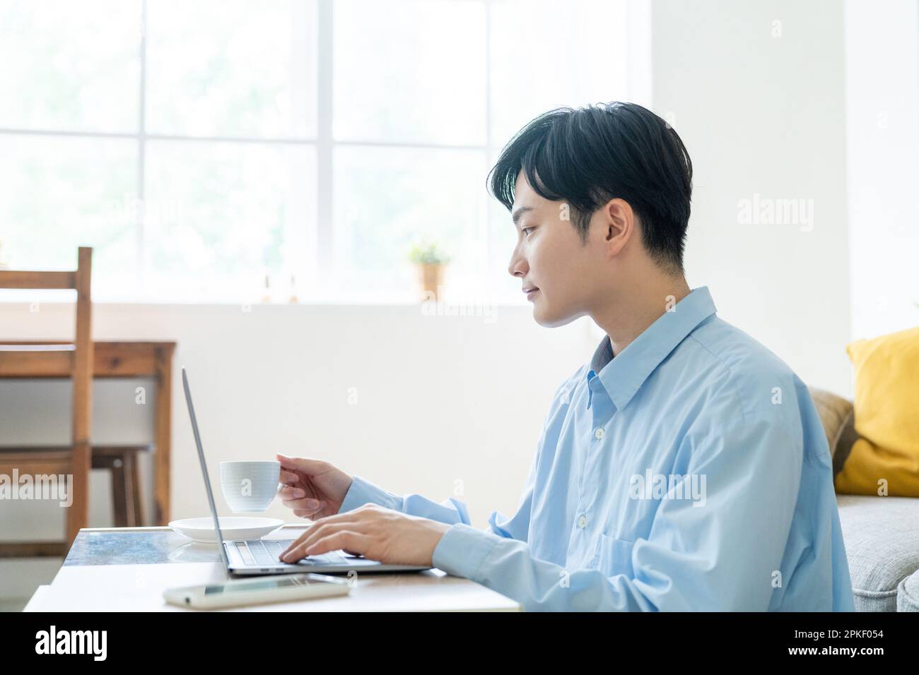 Man working remotely Stock Photo
