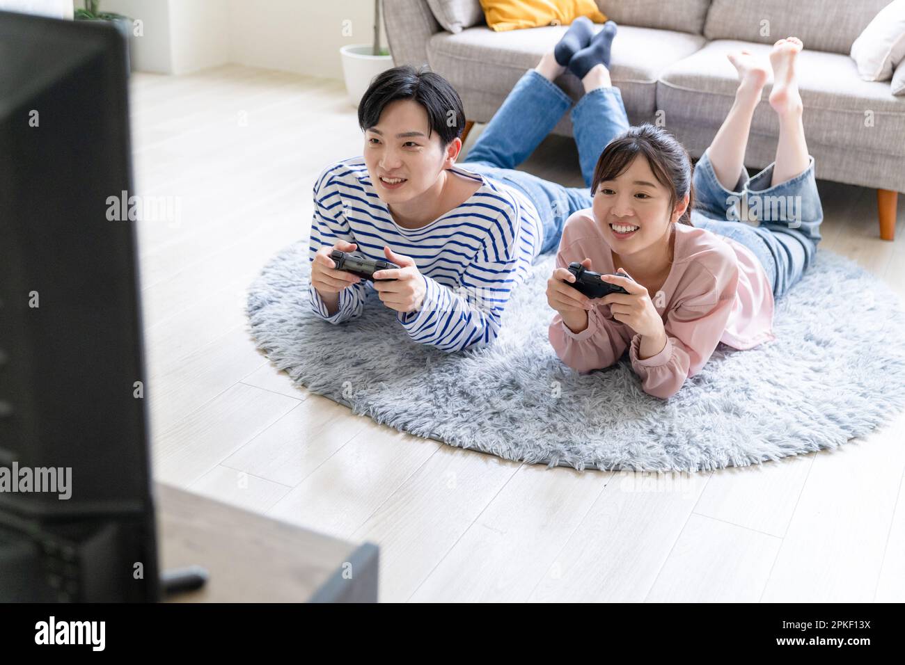 20s man playing video games hi-res stock photography and images - Alamy