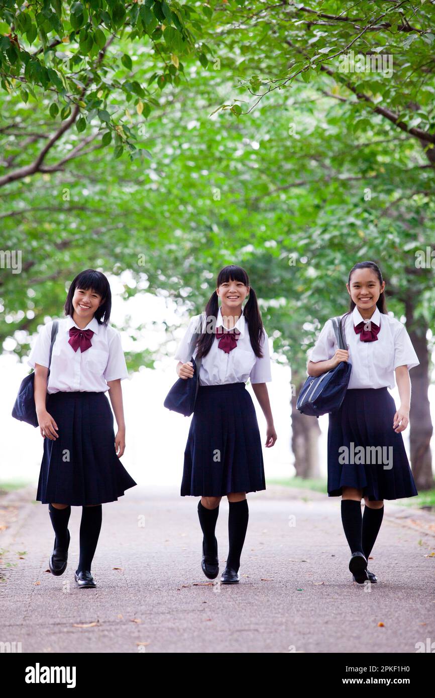 Junior high school students walking side by side Stock Photo - Alamy