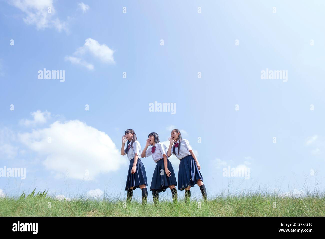 Junior High School Students Standing on the Bank Stock Photo
