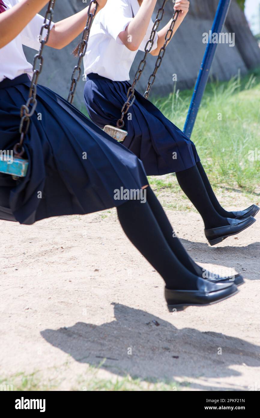 Junior High School Students Paddling on Swings Stock Photo Alamy