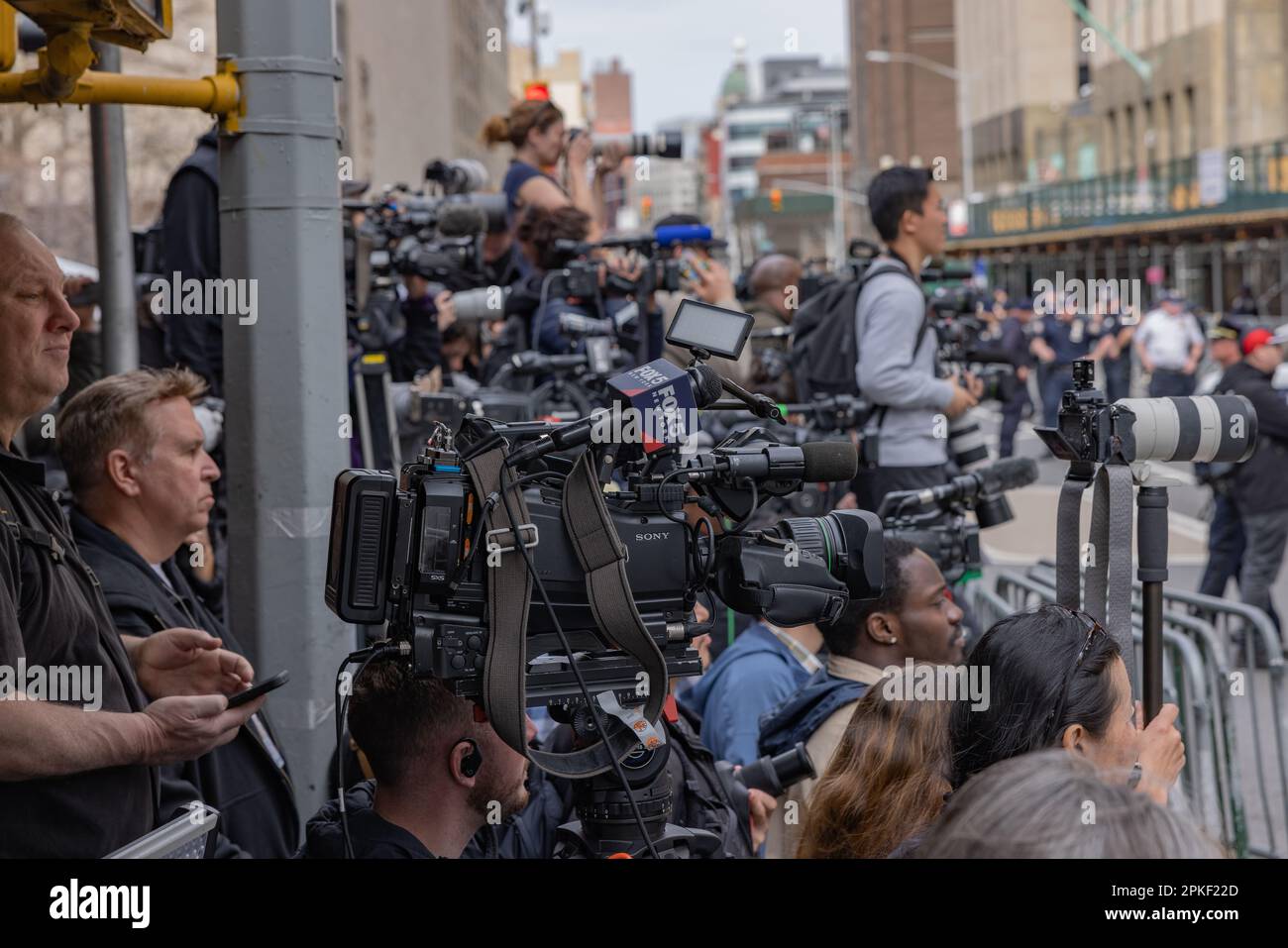 NEW YORK, N.Y. – April 4, 2023: Members of the media gather in Lower Manhattan to cover an arraignment hearing for former President Donald Trump. Stock Photo