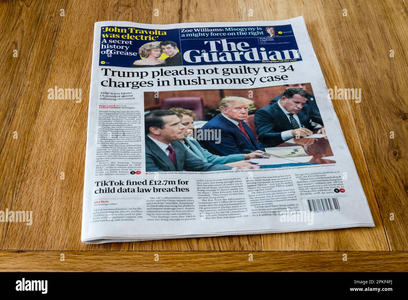 5 April 2023 Guardian headline reads Trump pleads not guilty to 34 charges in hush-money case. Stock Photo